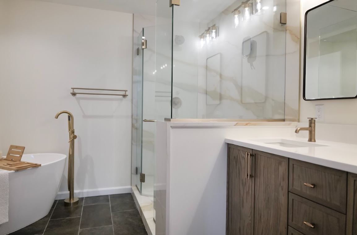 bathroom remodel with walk in shower and freestanding bathtub